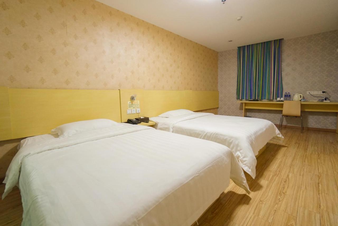 Jia Mei Xin Holiday Hotel Baiyun Airport Branch Canton Esterno foto
